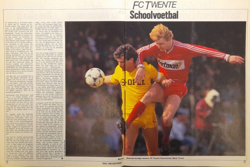 Jeugdvoetbalwedstrijd met twee spelers in actie, één in geel en één in rood.
